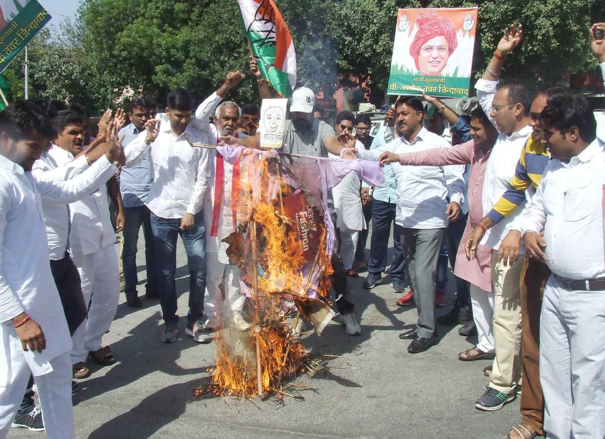 bhupendra singh hudda, ashok tanwar, hudda, congress, protest, protest against, case