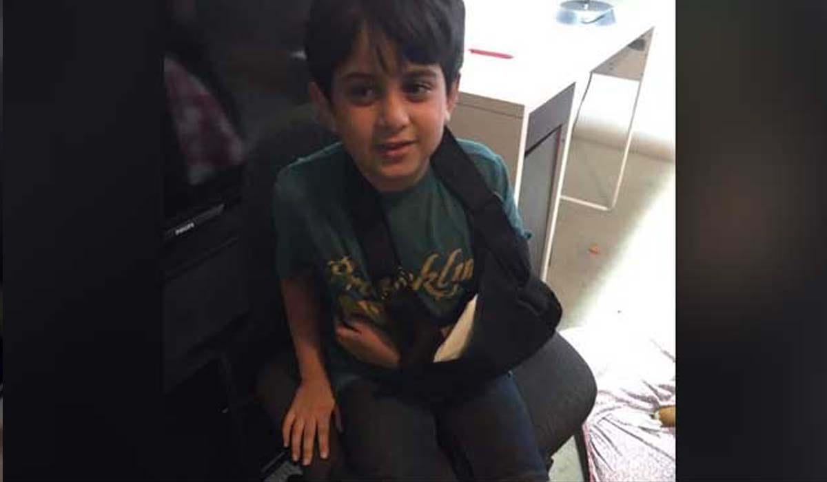 boy beatan by other students in america because he is a muslim