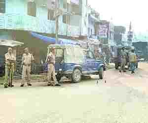 police and villagers clash