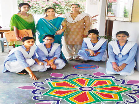 Rangoli in practice, defense and topped crest