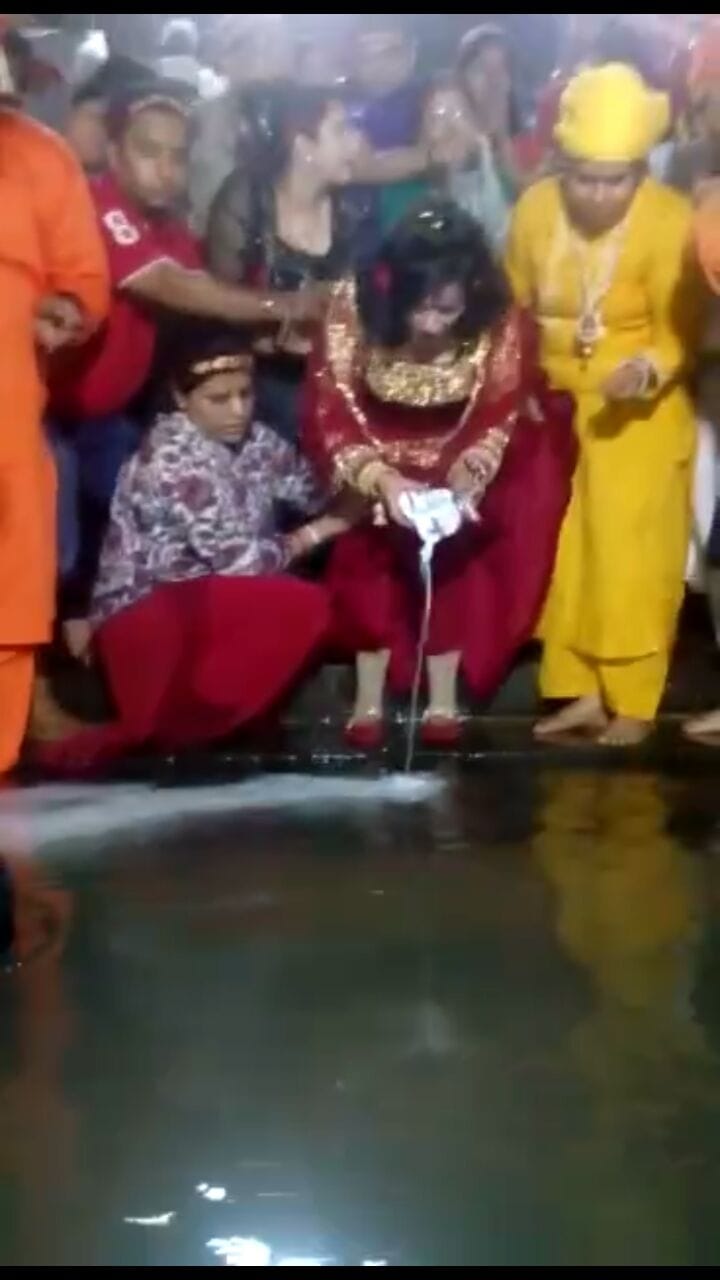 photo- radhe Maa arrived Ganga Ghats wearing the shoes, dispute.