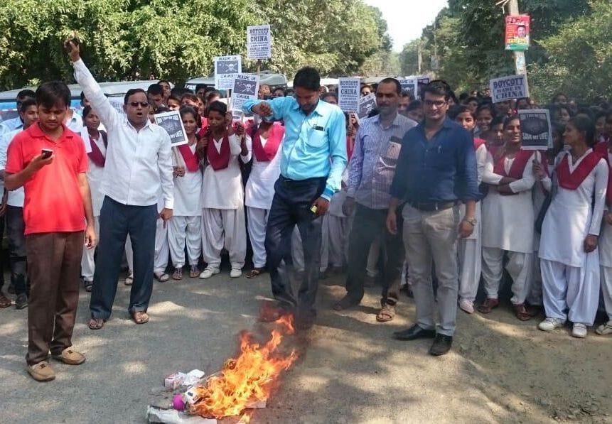 Students burned an effigy of China