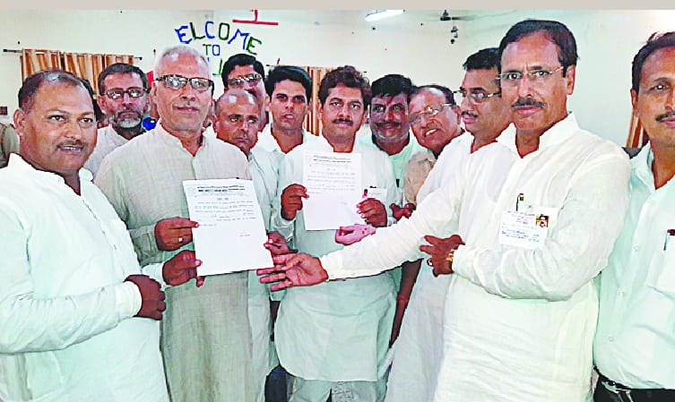 Devraj elected president and minister Manpal