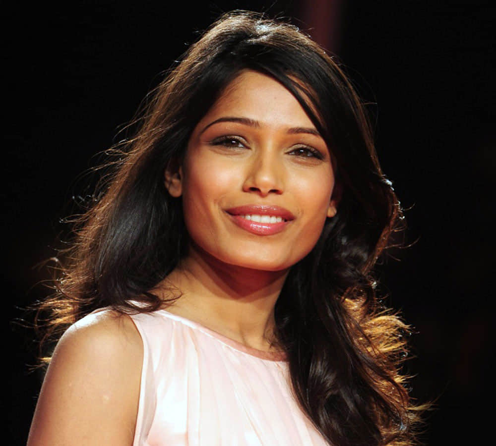 Freida Pinto wanted to be Bacardi shot server