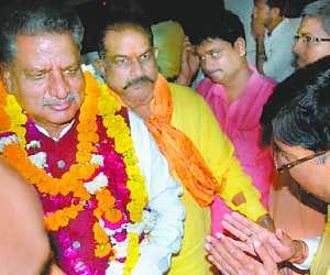 Lotus blooms on each seat: ः OM Mathur