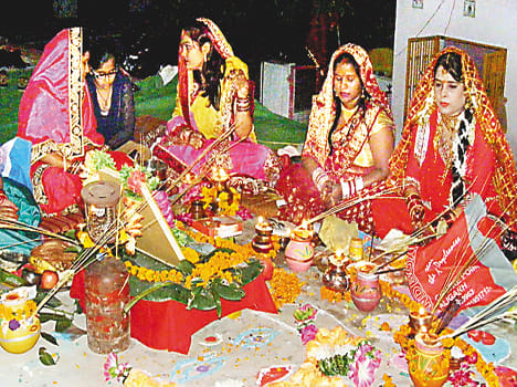 Suhaginon sieve admiring the moon wished longevity of husband