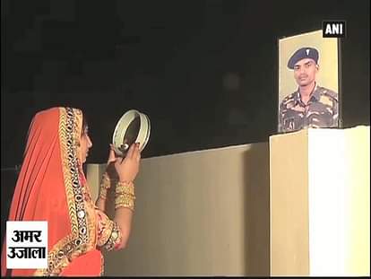 Soldier's wife ends Karwachauth fast by performing rituals before his photo