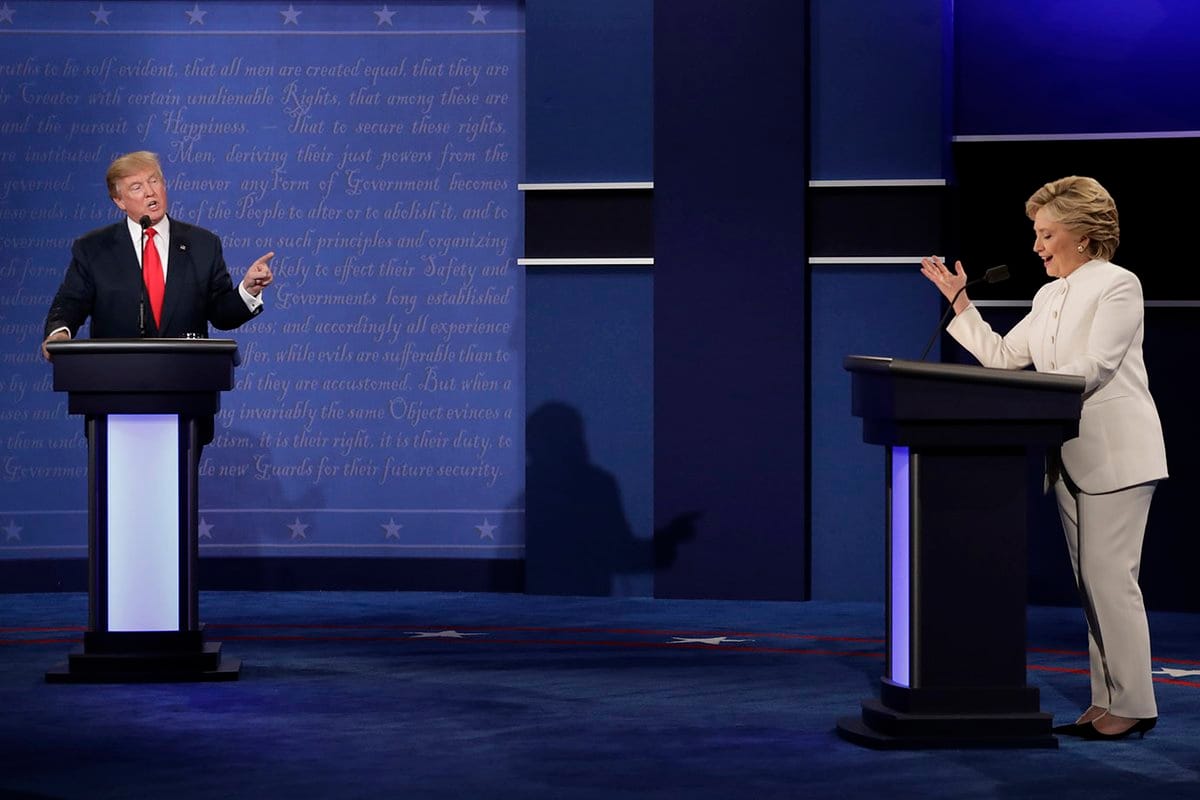 Clinton, Trump battle over Russia's Putin