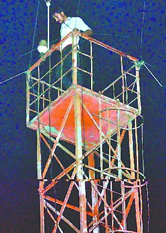 Minda company employee climbed up the tower 