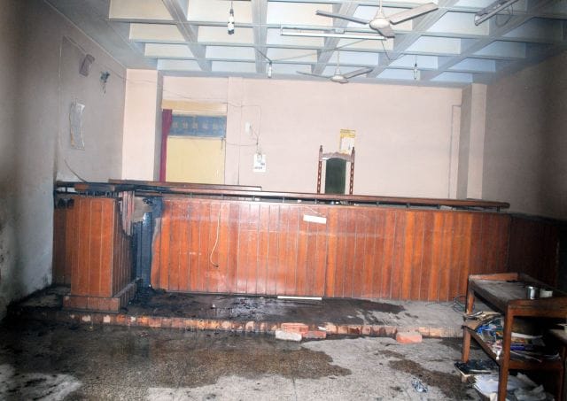 Court room fire, burn Witness Box