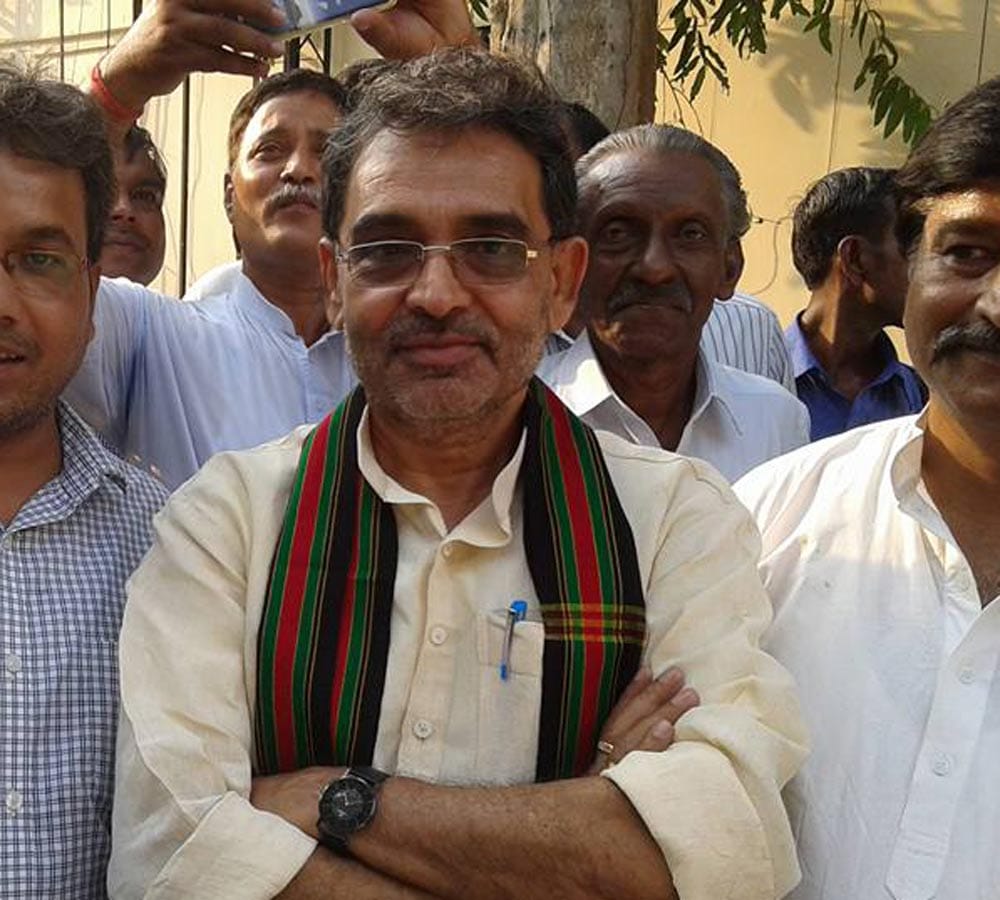 minister upendra kushwaha doing yoaga in the ashram of ramdeo