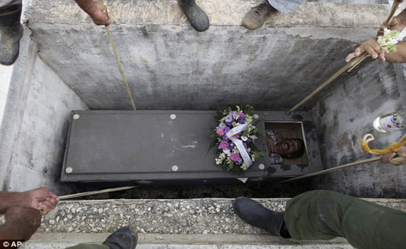 Cubans 'bury' man alive in bizarre village festival 