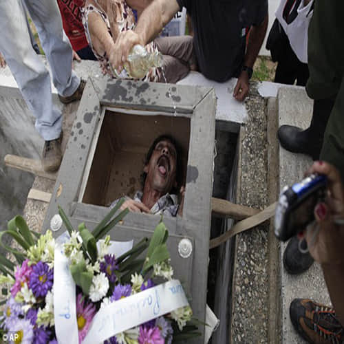Cubans 'bury' man alive in bizarre village festival 