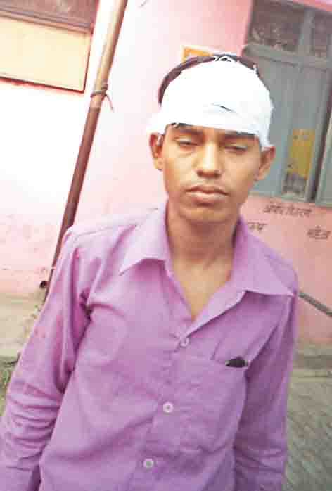 young beaten on railway station