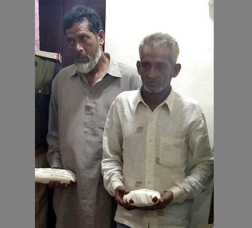 two men arrested with one kilogram charas.