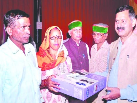 17.20 lekhs check give to worker in ghumarnvi. 