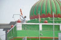 religious place, people host kesariya flag, police arrest, panipat
