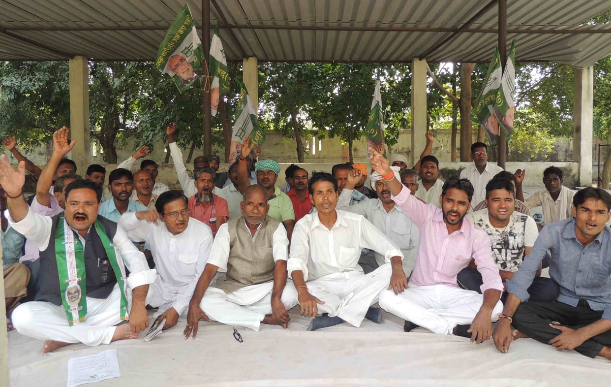 JD-U to the demands of workers picketing