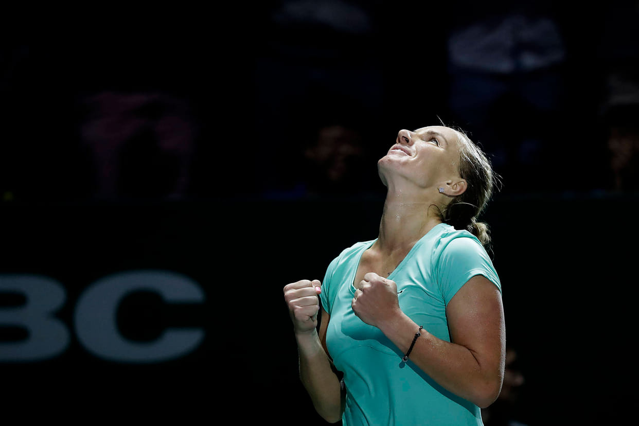 women tennis Player used scissor while playing in the court 