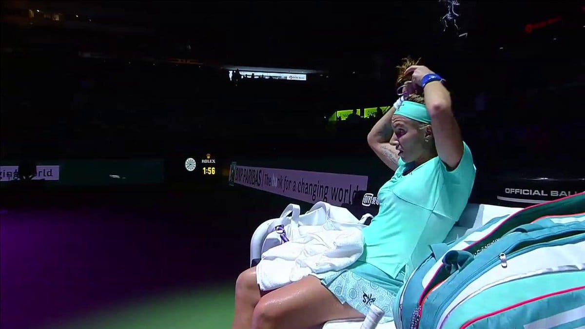 women tennis Player used scissor while playing in the court 