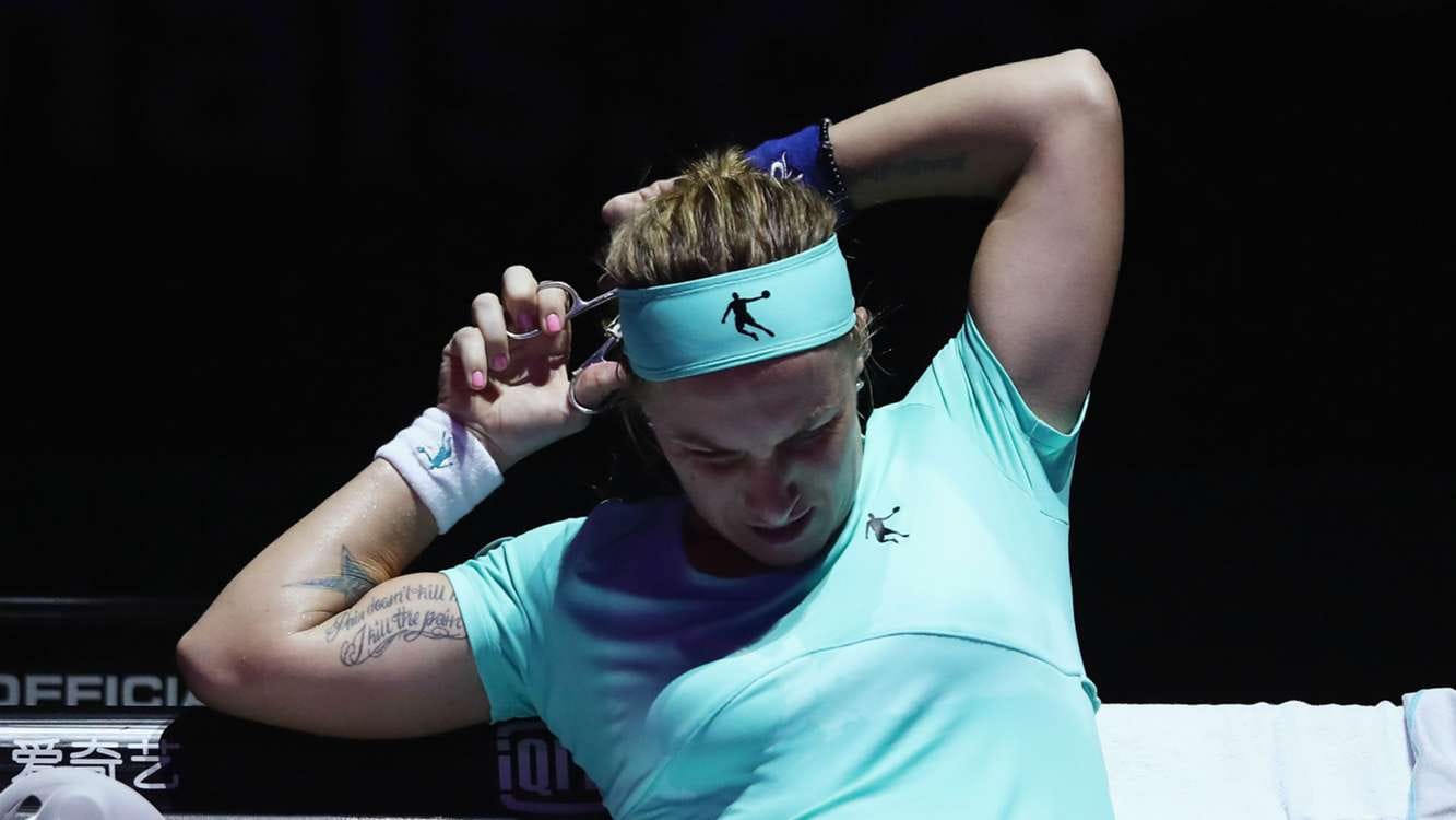 women tennis Player used scissor while playing in the court 