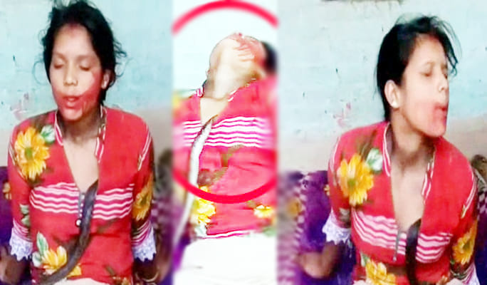 snake wrapped around neck of girl who believe goddess