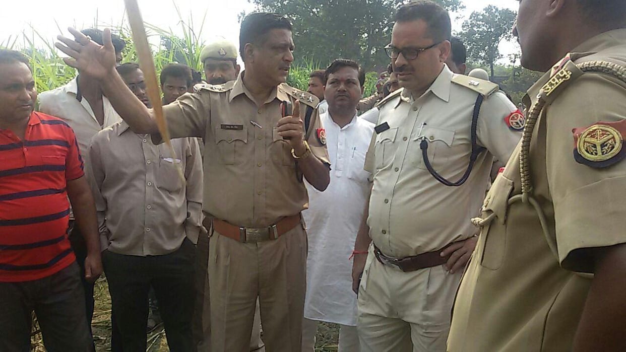 Villagers beat two men killed