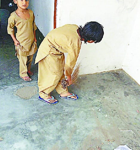 Broom is a thrill to children in elementary school