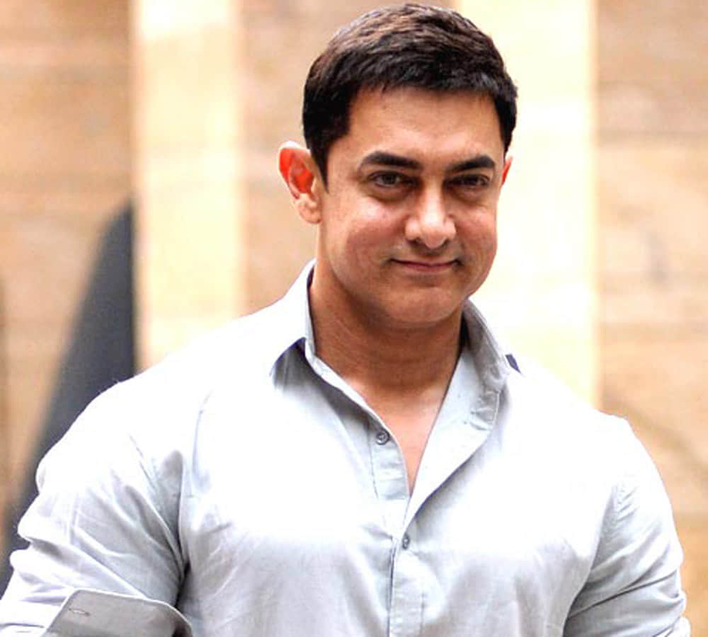 Pooja Bedi wants Aamir to spit on her daughter's hand
