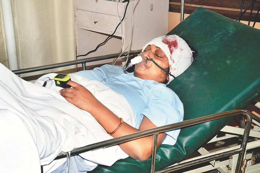 The woman shot in the head smash against