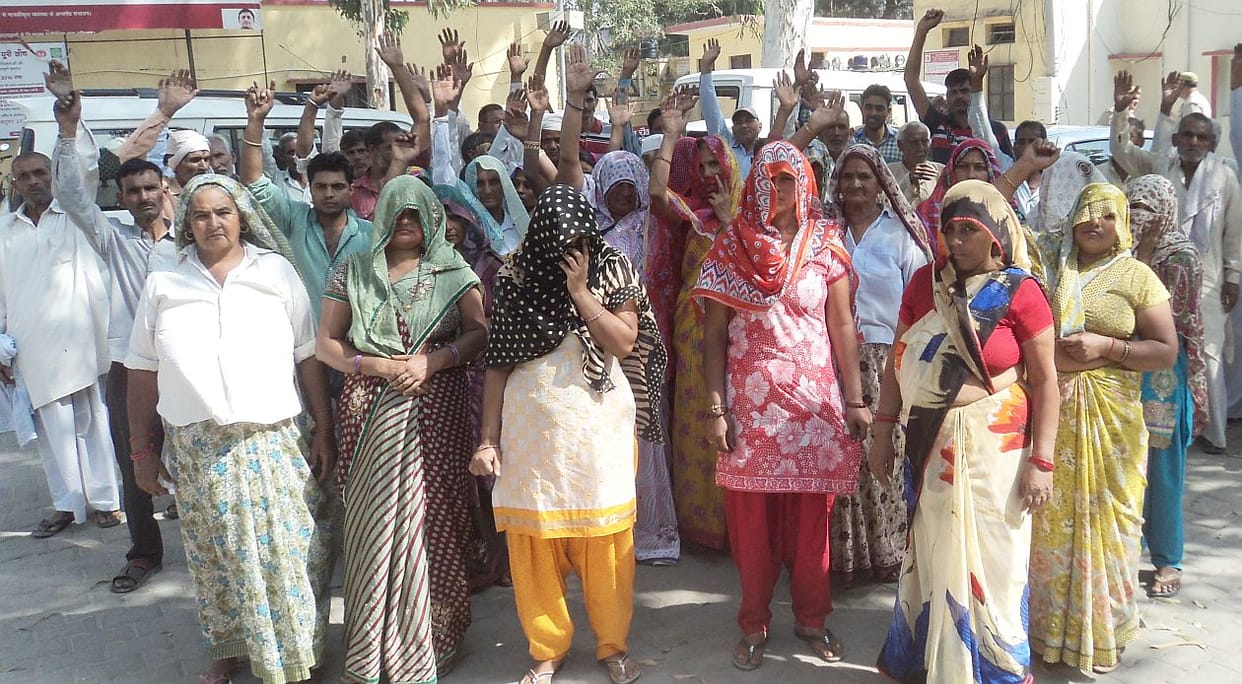 Villagers protest collectrate.