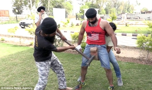 Steel Man Of India Amandeep singh, Lets Cars Run Over His Stomach