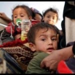 IS fighters in Mosul shield children made
