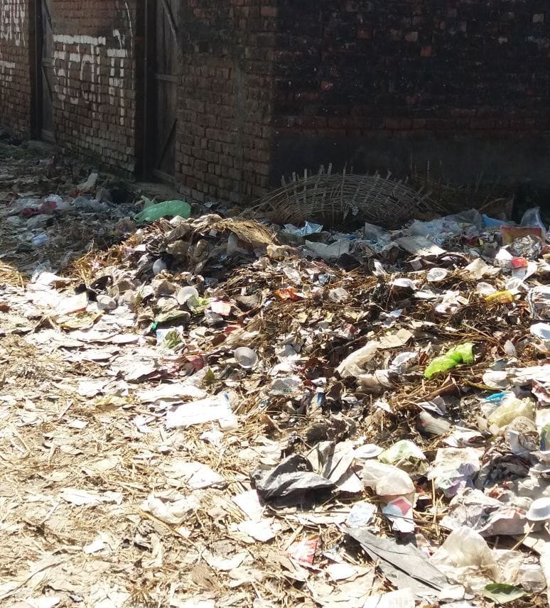 Biscohr mounds of garbage in the streets