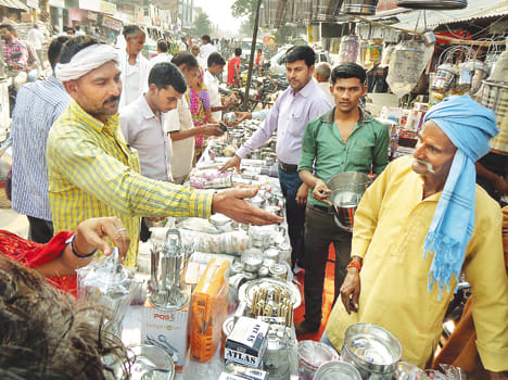 The market is buzzing with shopping on Dhanteras