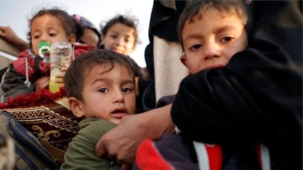 IS fighters in Mosul shield children made