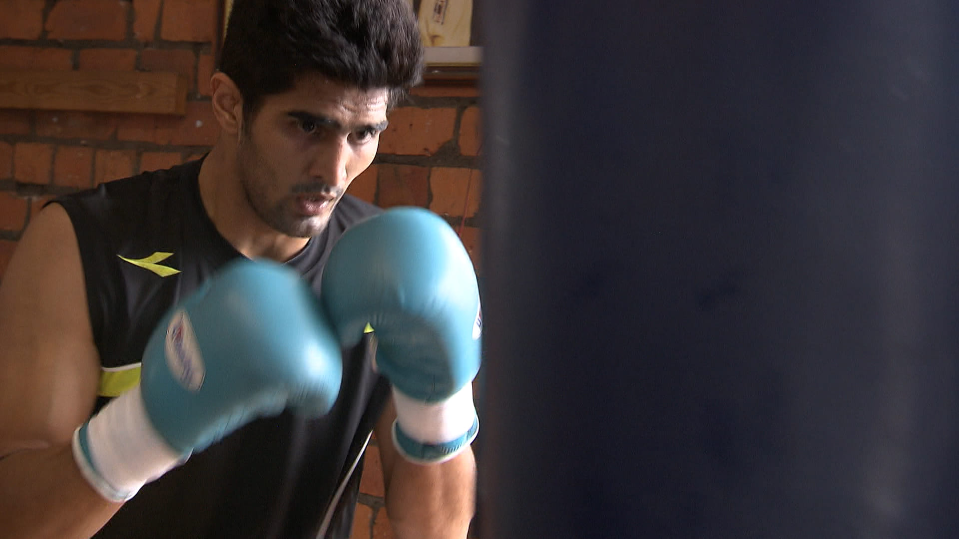 indian boxer vijender singh vs chinese boxer zulpikar maimaitiali