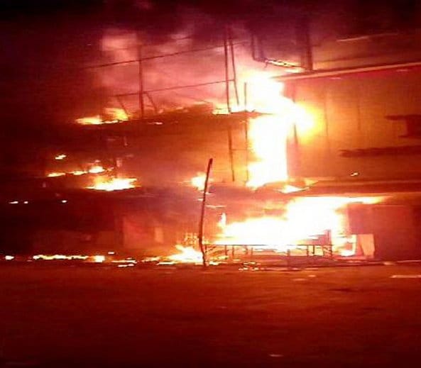 house burns by lamp 