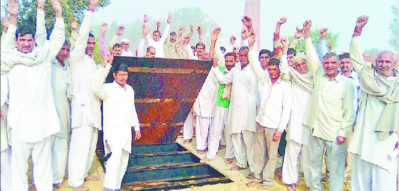 Weighing forks farmers uprooted