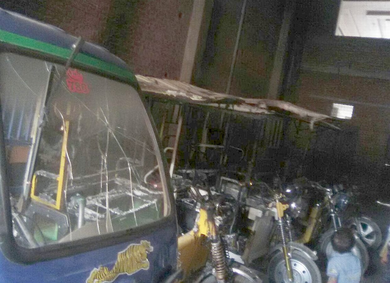 E-rickshaw stand  parking lot fire