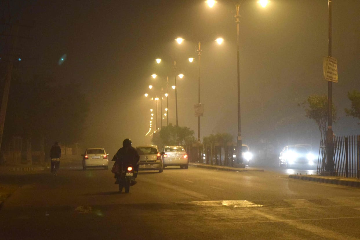 City under smog cover