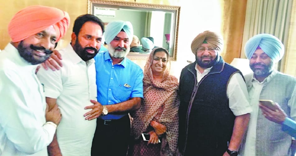 in the presence of Captain amarinder singh Dhillon and Jaspal Singh hugged 