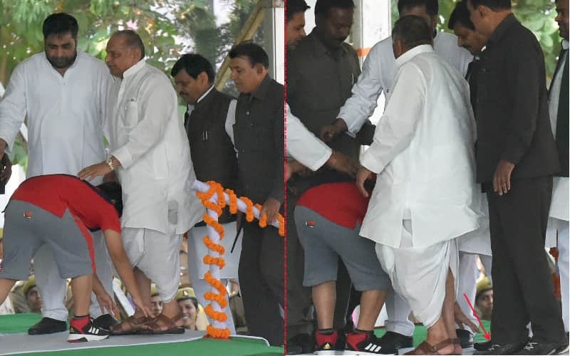 akhilesh son arjun touches feet of mulyam and shivpal