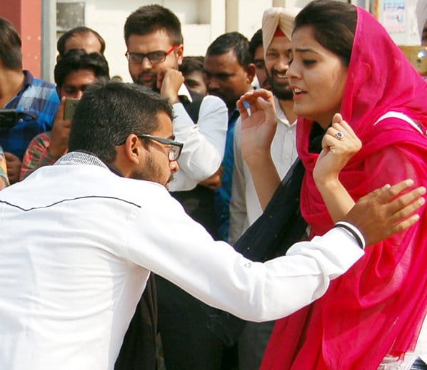 street play by students on road for awareness of legal authority and rights of women