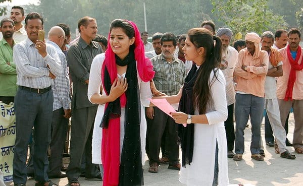 street play by students on road for awareness of legal authority and rights of women