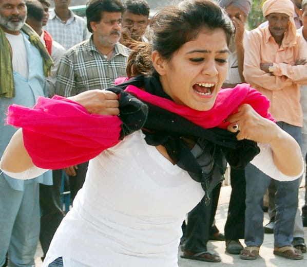 street play by students on road for awareness of legal authority and rights of women