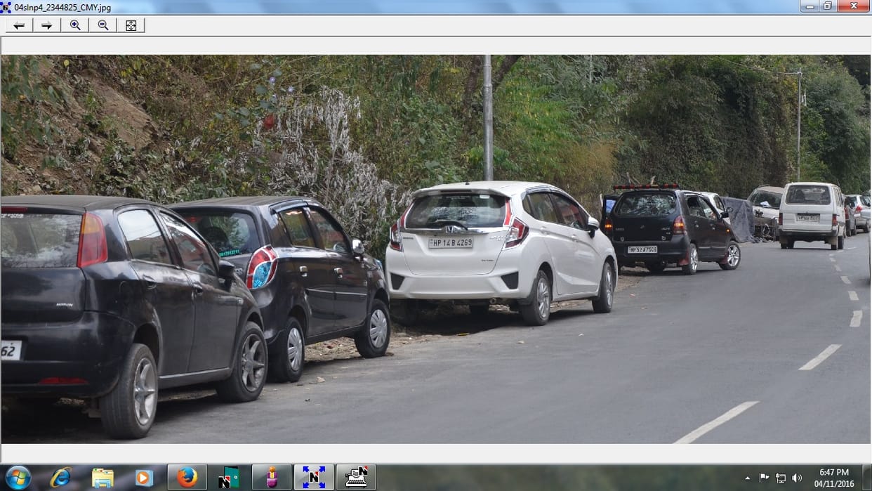 The vichel stand in the No parking Zone