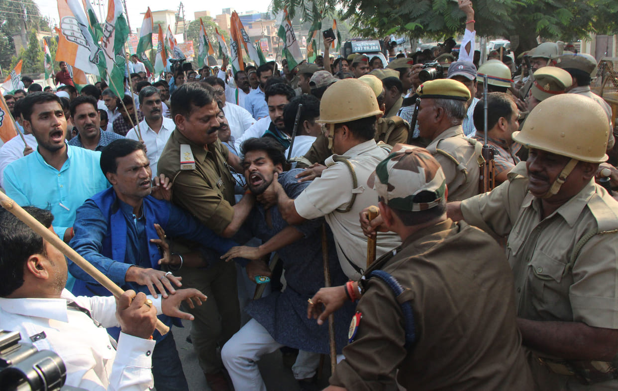 Congress workers and police scuffle