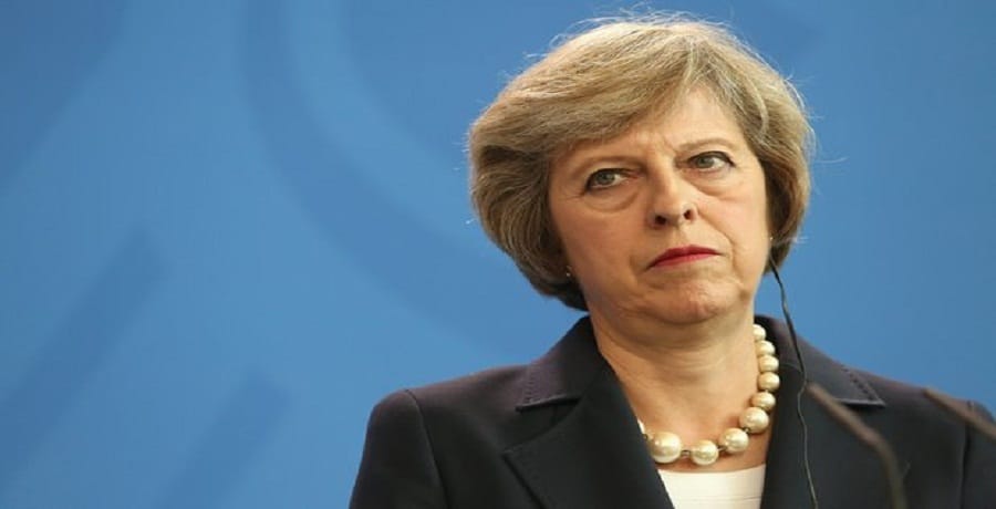 British PM theresa may wins party confidence vote
