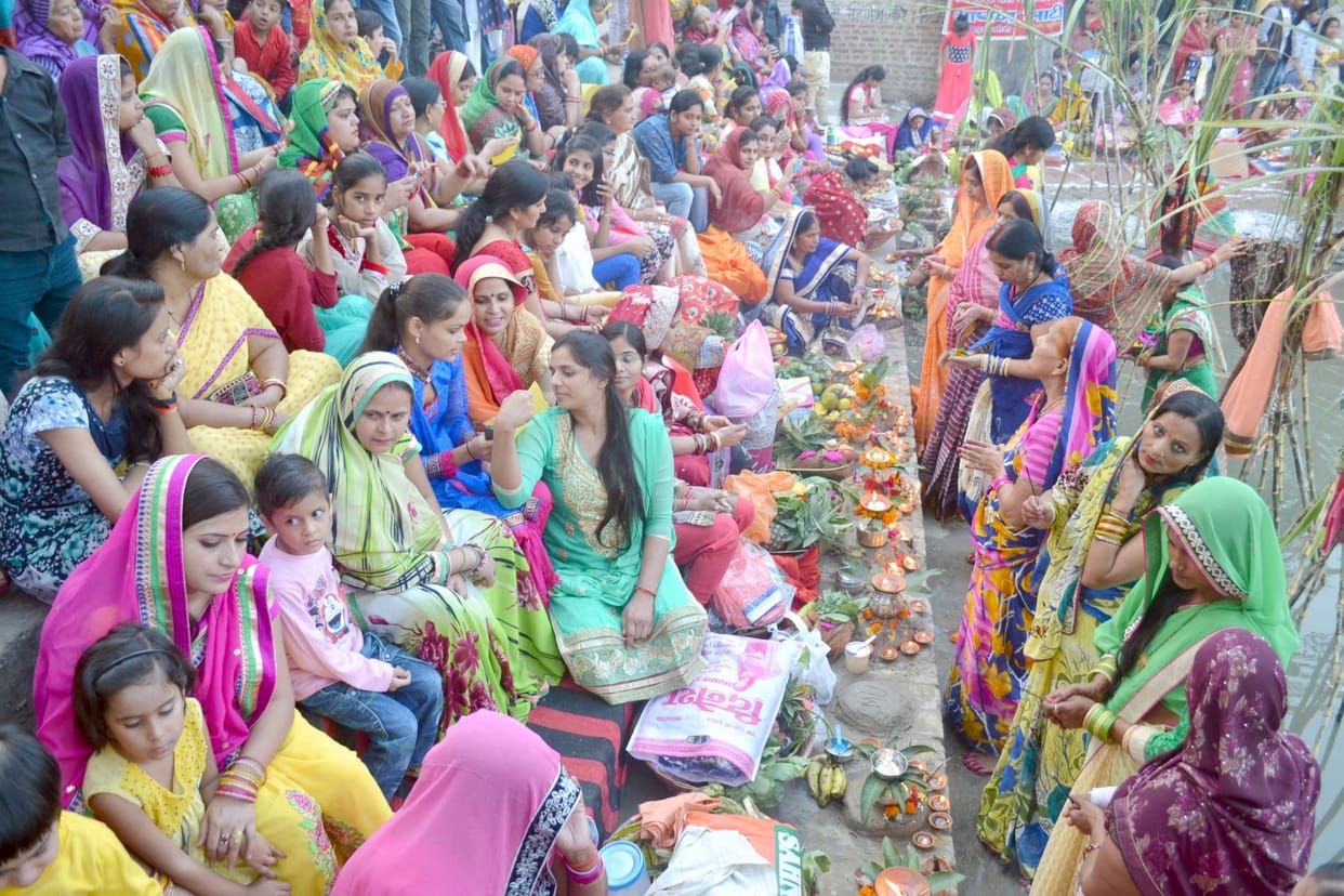 Women declining sun Chhath to offer water to worship him